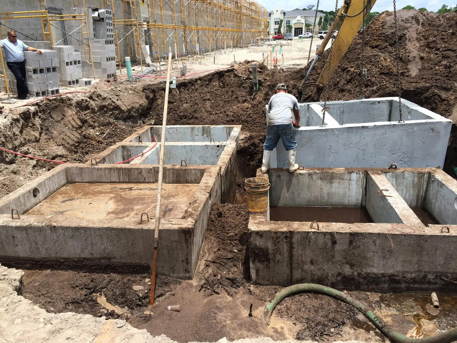 New concrete septic tanks being set in place